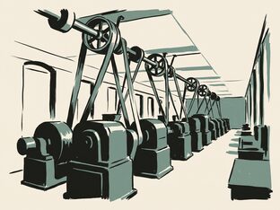 An old factory floor with an overhead line shaft and belts dropping to machines